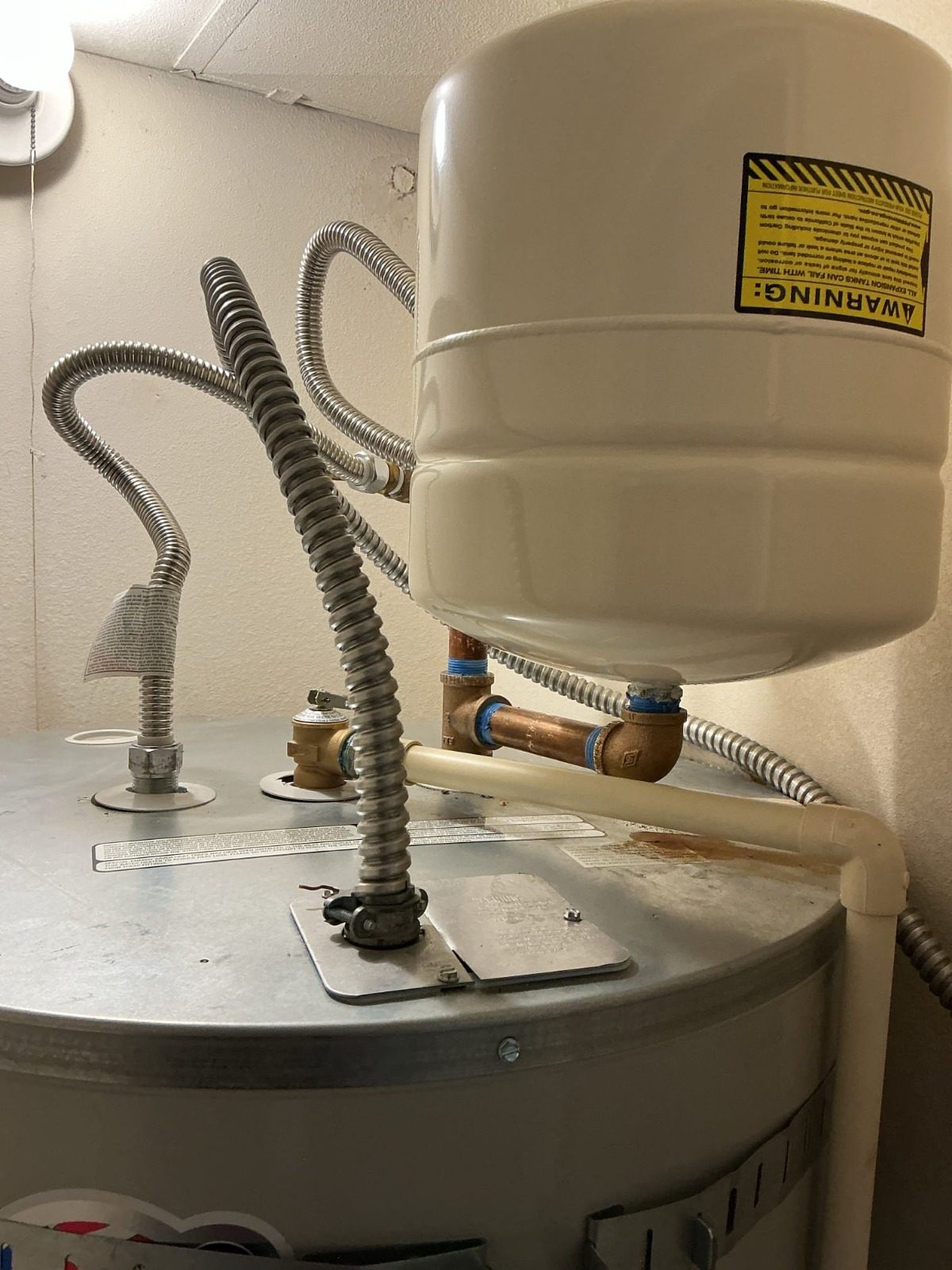 Water heater repiped from galvanized to copper with brass fittings in Marysville, WA