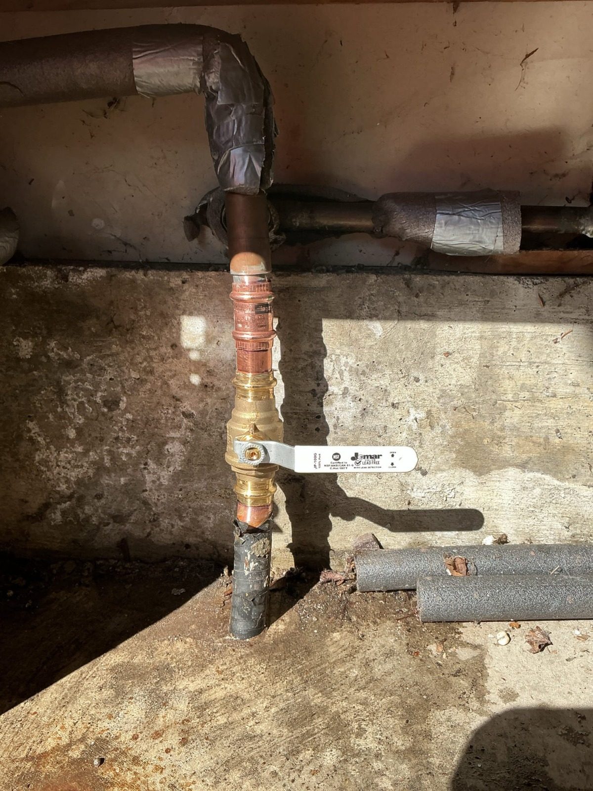New lead-free brass ball valve replacing a leaking gate valve on a water line in Bothell, WA